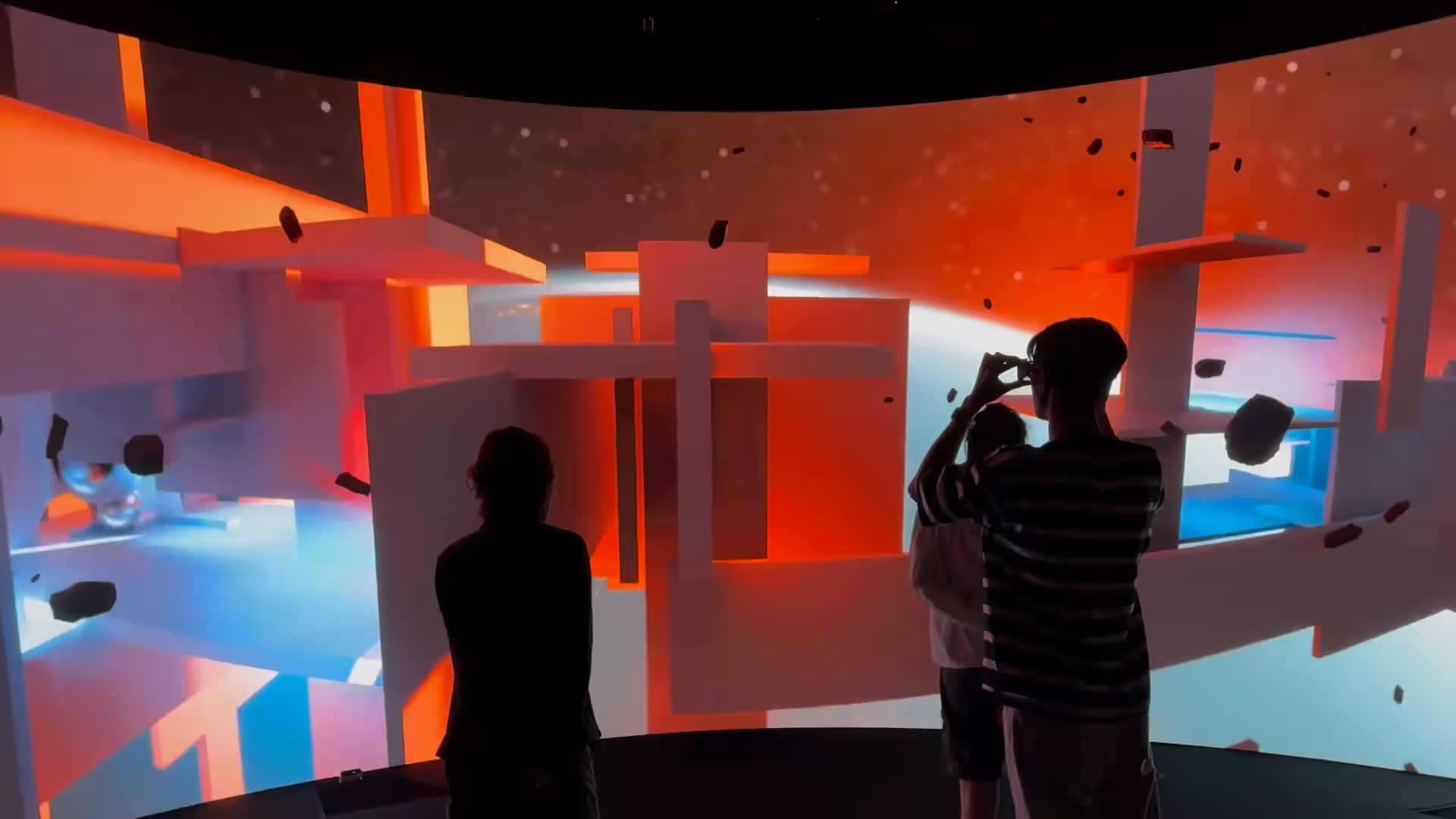 Silhouettes inside Horizon 25 — orange/red architectural sequence, VRC