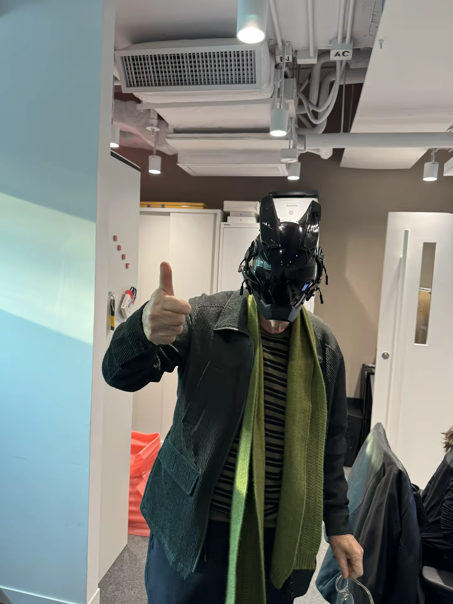 Prof. Jeffrey Shaw with Dogrush mask — thumbs up