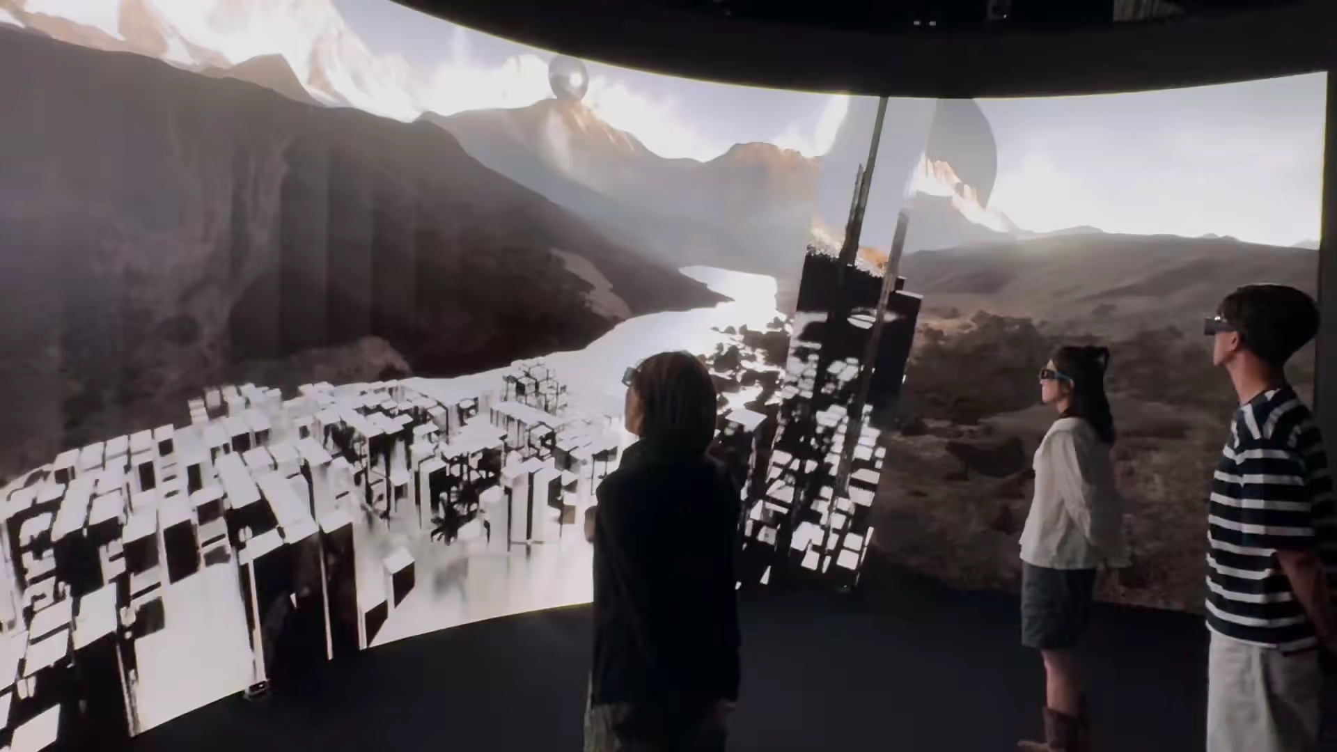 Three viewers watching mountain landscape and city — VRC stereoscopic screen