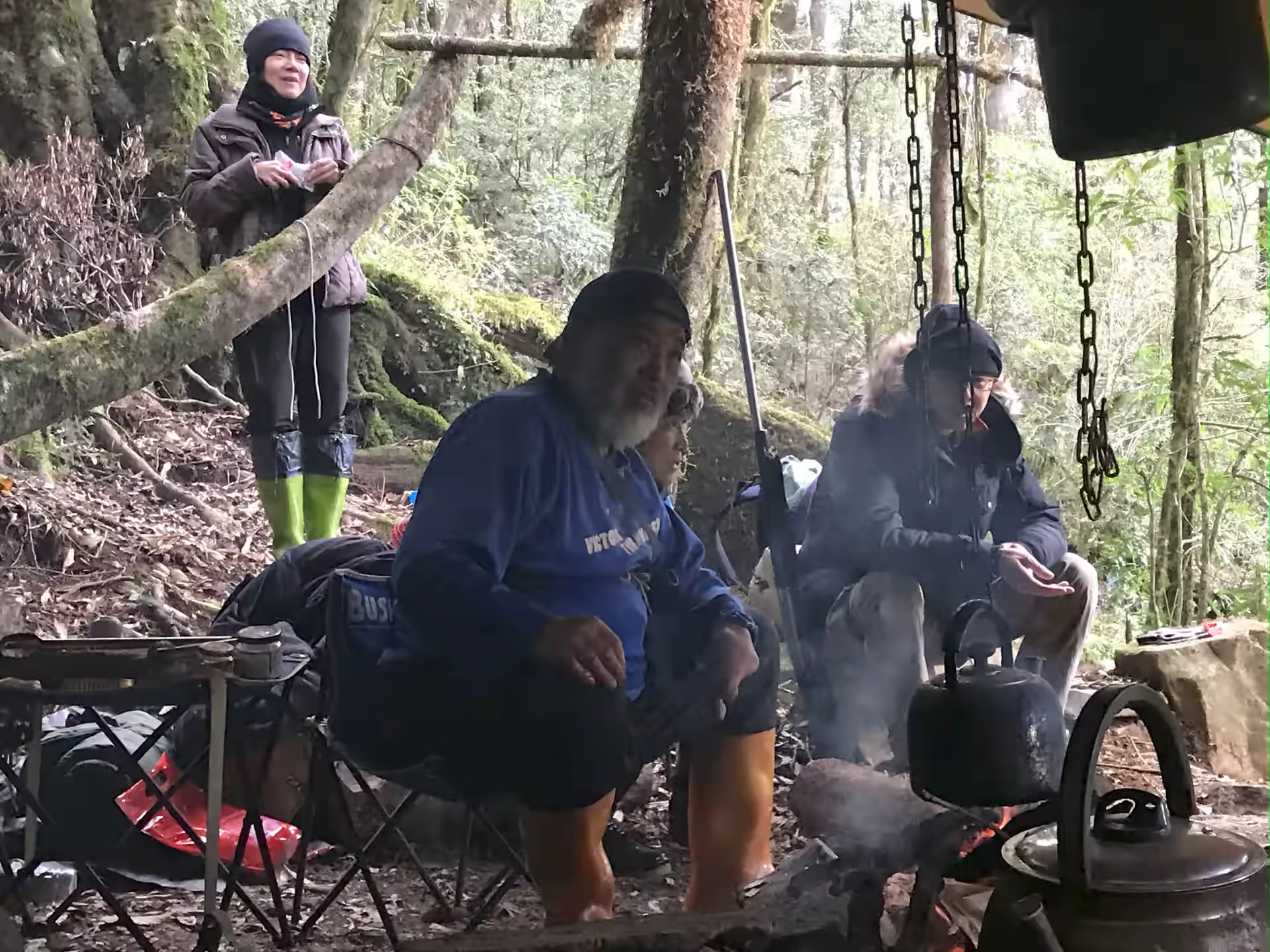 Hunters resting at the forest camp