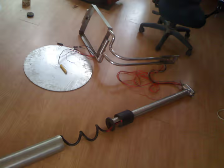 Device parts laid out during assembly and wiring tests