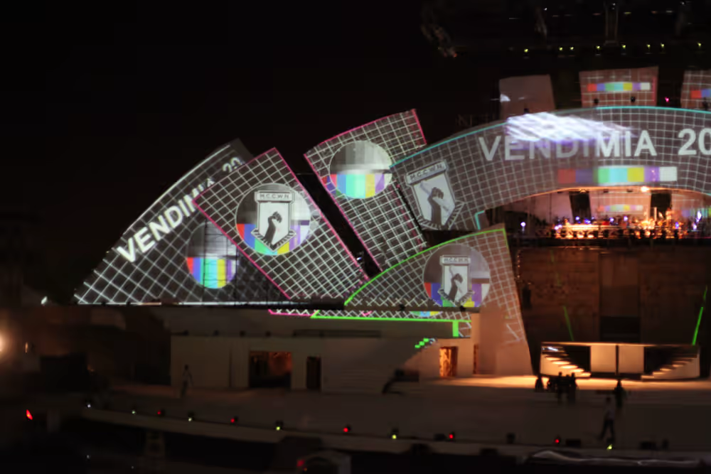 Technical projection mapping test with grids, calibration patterns and reference text.