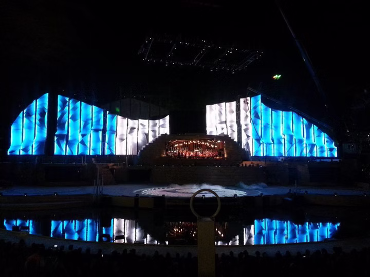 Night documentation view of Vendimia 2015 with blue-white scenic lighting