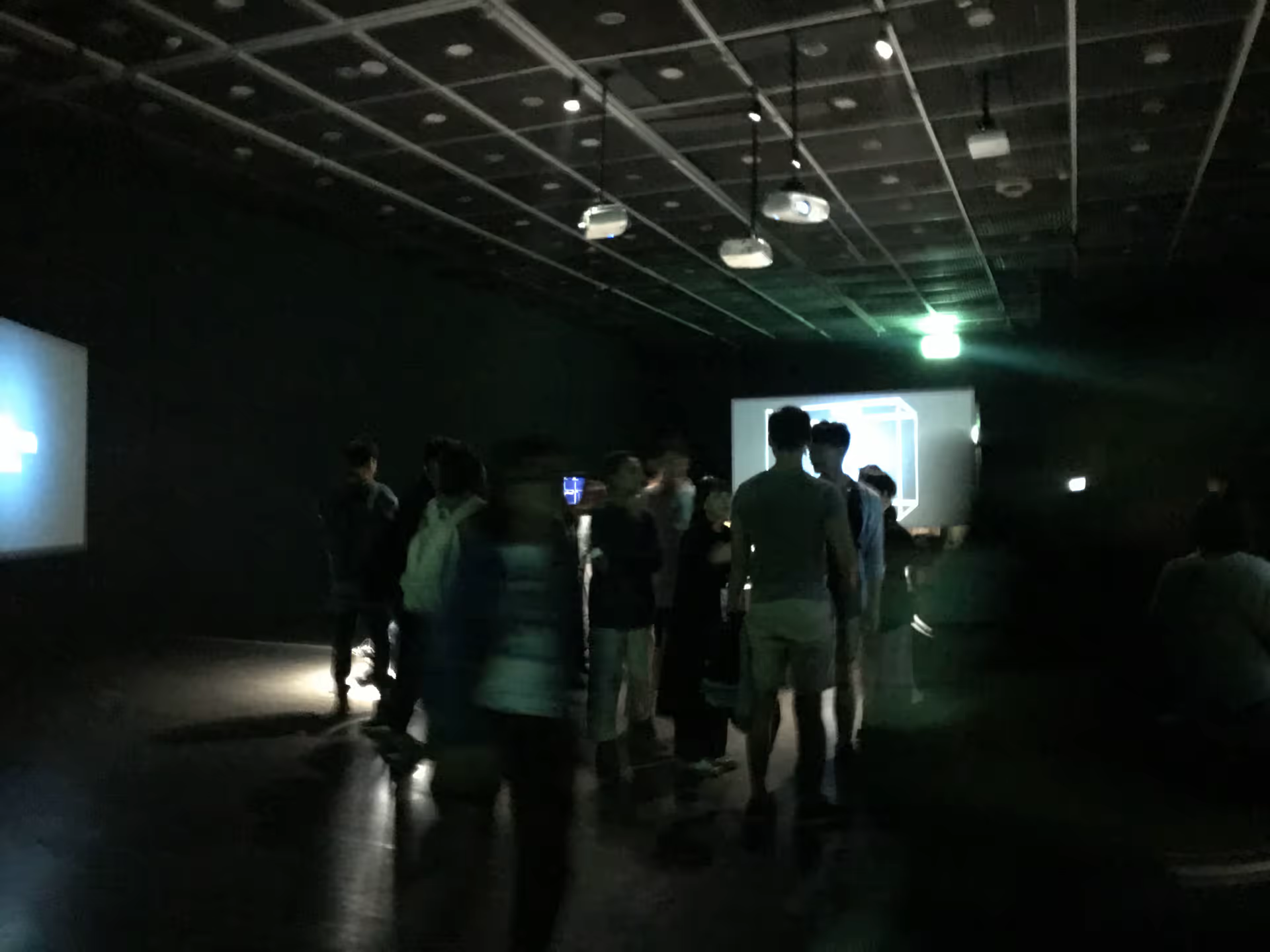 Exhibition overview with multiple screens
