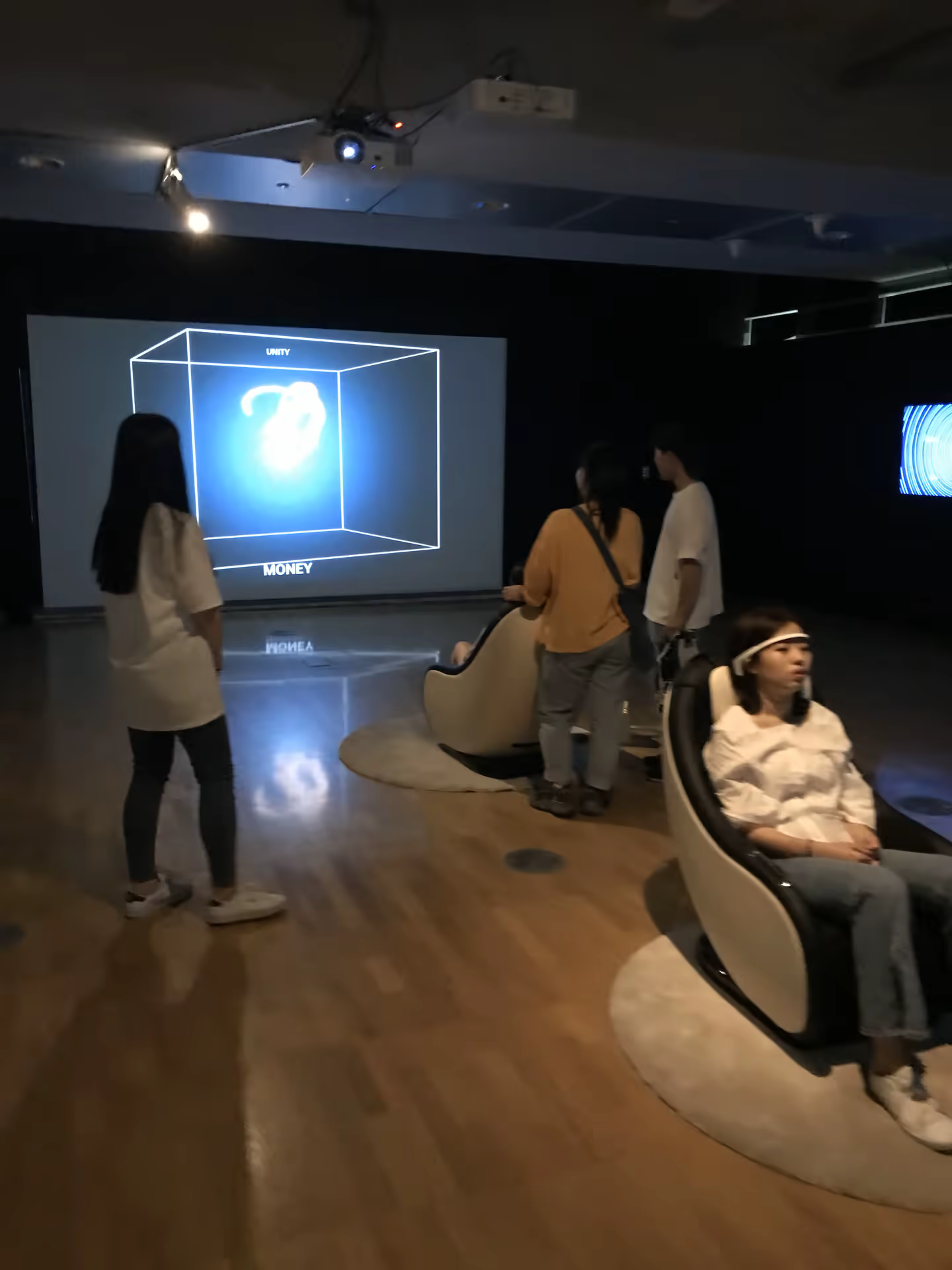 Exhibition view with money model